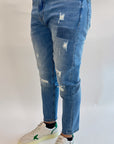 Jeans Gianni lupo con graffi, rotture e toppe