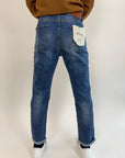 Jeans OverD con graffi e rotture